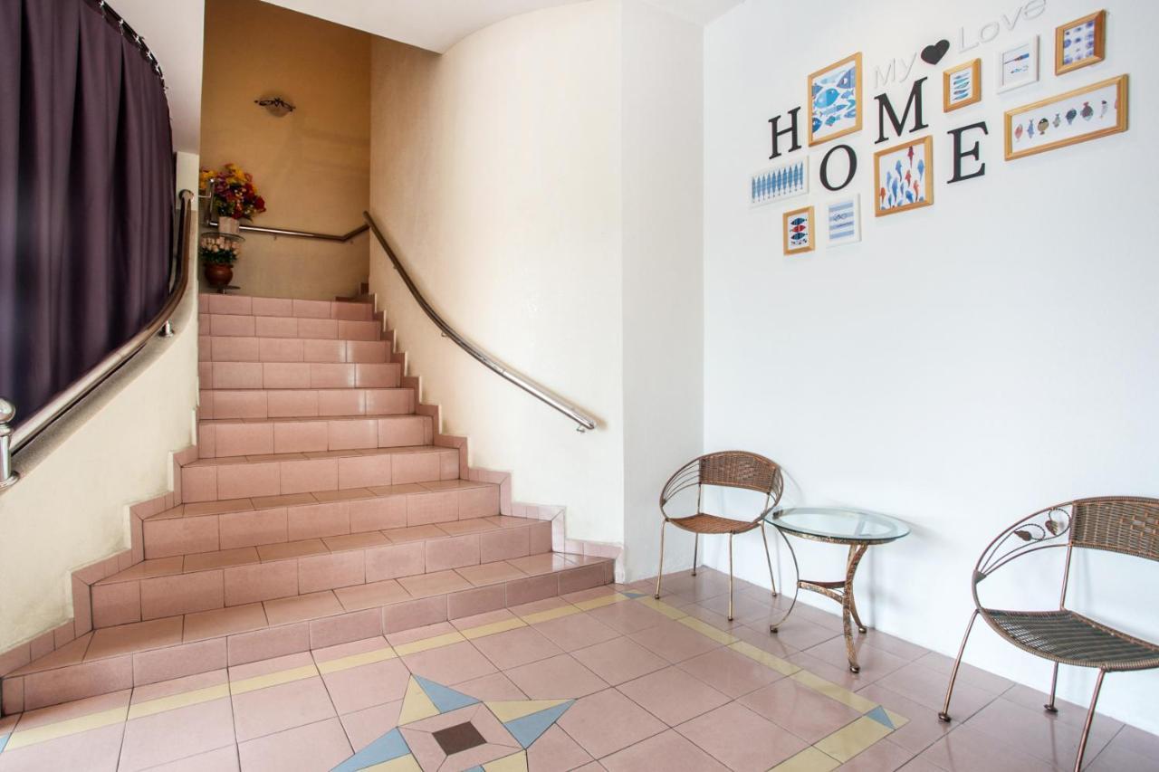 Hotel Home 88 Телук-Интан Экстерьер фото